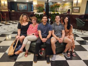 Small group together at their hotel